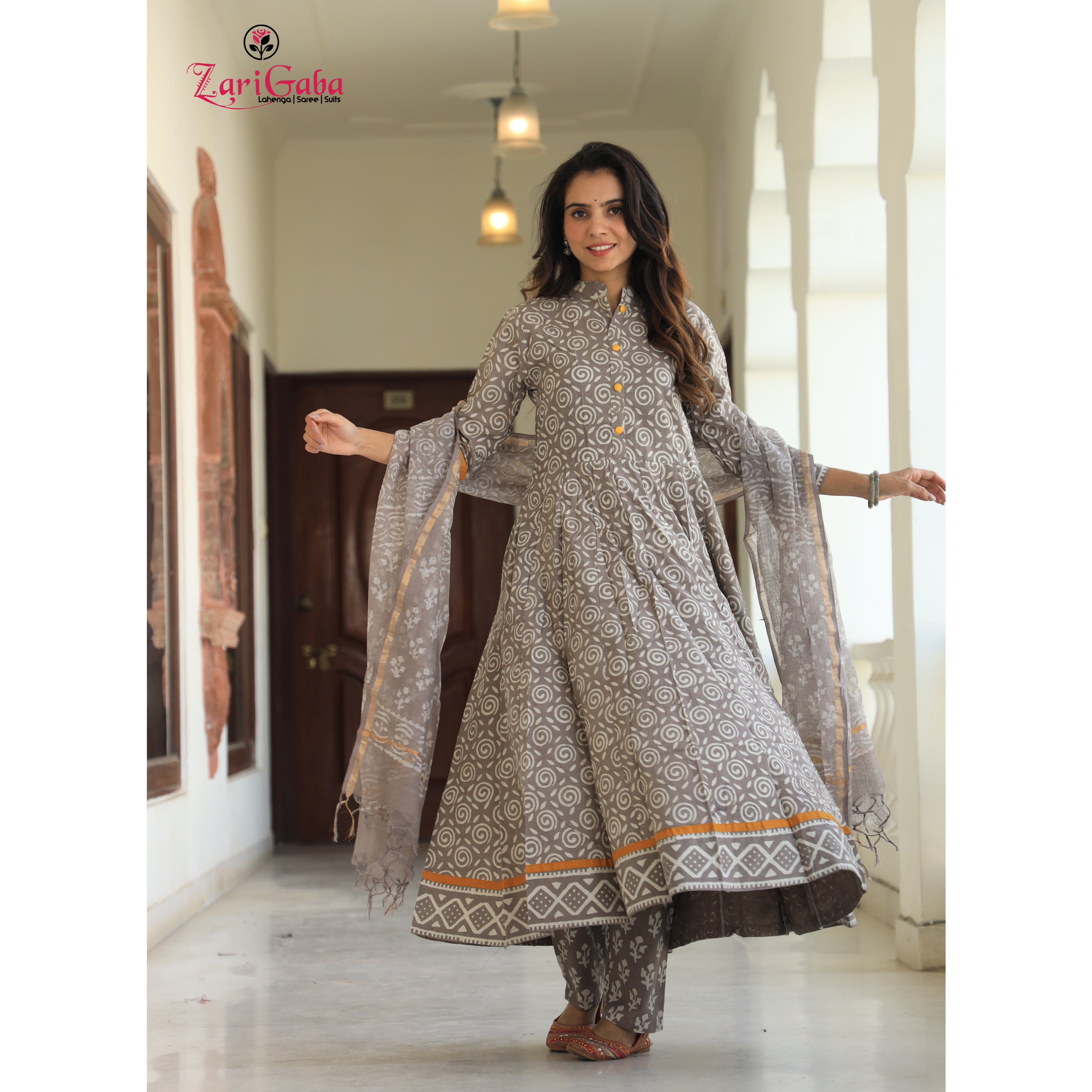 Silver Anarkali suit with Mulmul Dupatta